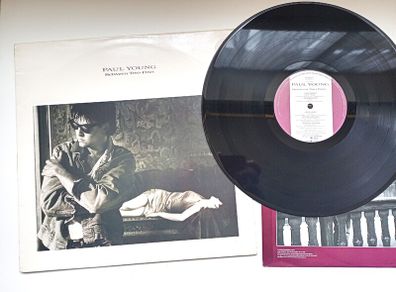 Paul Young Between Two Fires  Album