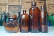 484 - Set of 4 Vintage Brown Amber Glass Screw Top Collectible Decorative Bottles