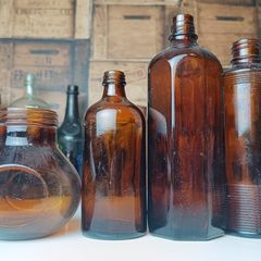 484 - Set of 4 Vintage Brown Amber Glass Screw Top Collectible Decorative Bottles