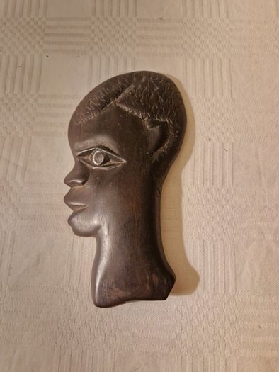 African carved black wood profile silhouette wall hanging