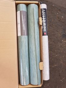 Three rolls of wallpaper