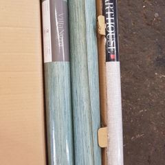 Three rolls of wallpaper