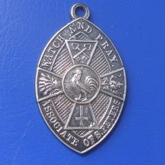 ASSOCIATE OF ST. PETER (religious fraternity?) - an Associate's membership silver medal (hallmarked for 1959)