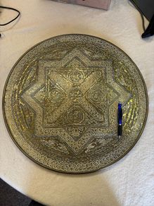 Embossed wall plaque