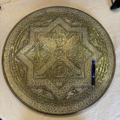 Embossed wall plaque