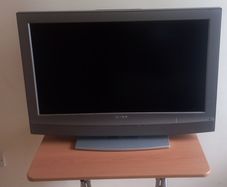 Second hand Sony TV with remote control for sale