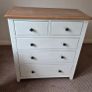 Two sets of wooden drawers. Image 6
