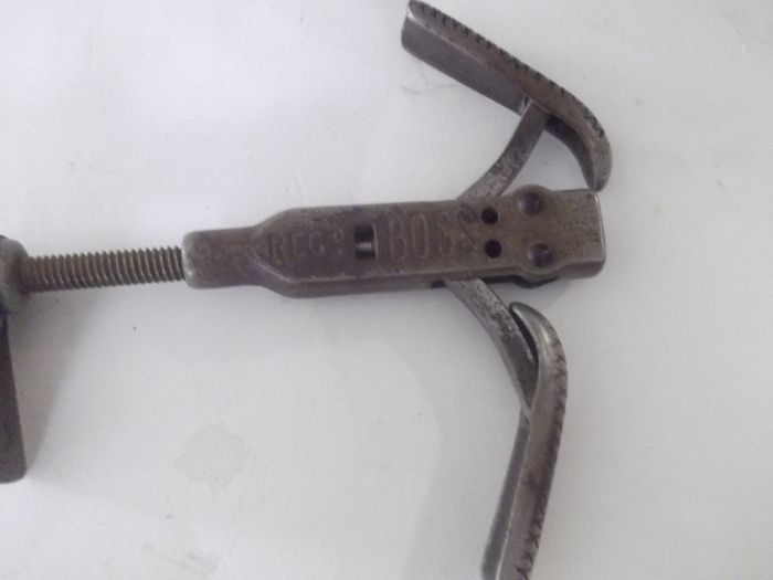 a antique steel adjustable shue stretcher