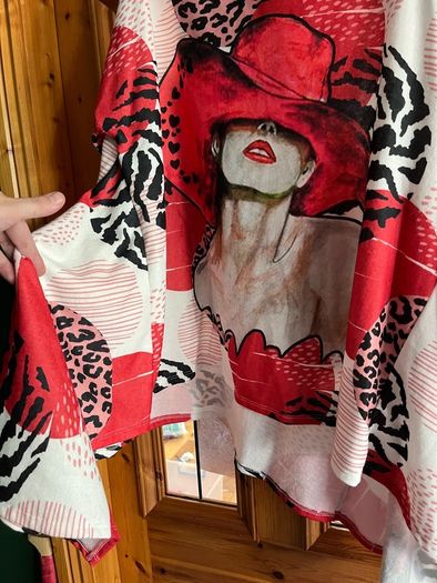 Poncho jumper turtleneck