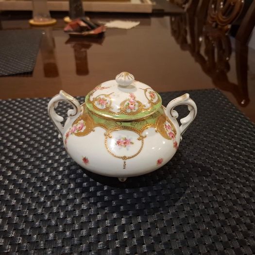 Antique tea pot sugar bowl and milk jug