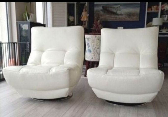 White leather armchairs