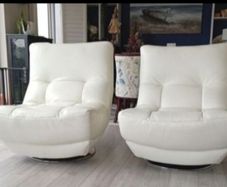 White leather armchairs