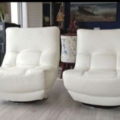 White leather armchairs