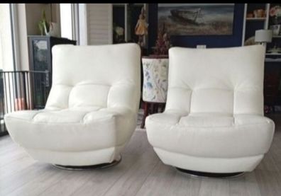 White leather armchairs