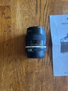 Nikon 55mm lens with caps