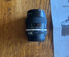 Nikon 55mm lens with caps