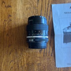 Nikon 55mm lens with caps