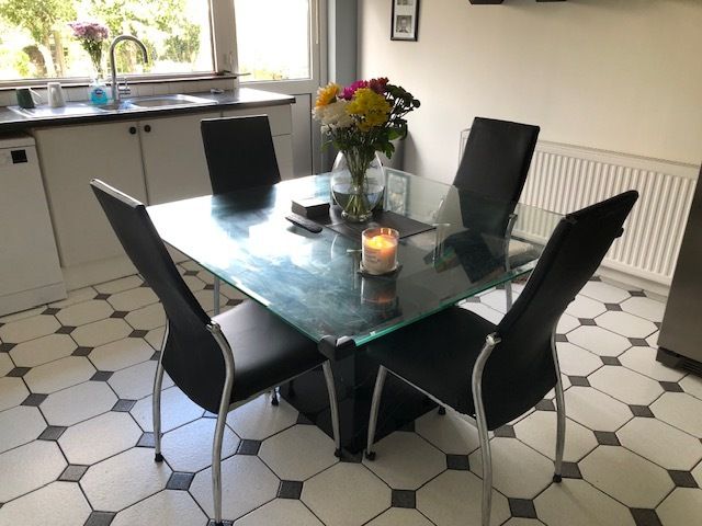 Glass table and 6 chairs