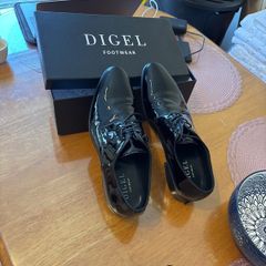 High gloss black shoes worn once for a wedding.