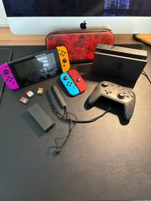 nintendo switch with accessories and games