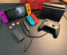 nintendo switch with accessories and games