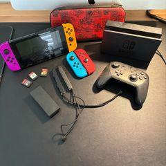nintendo switch with accessories and games