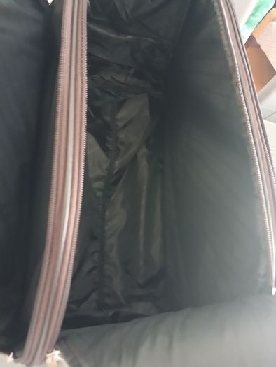 Brown carrier bag on wheels