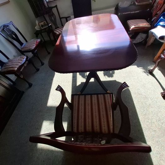 Hand carved Mahogany dinning table with 6 chairs