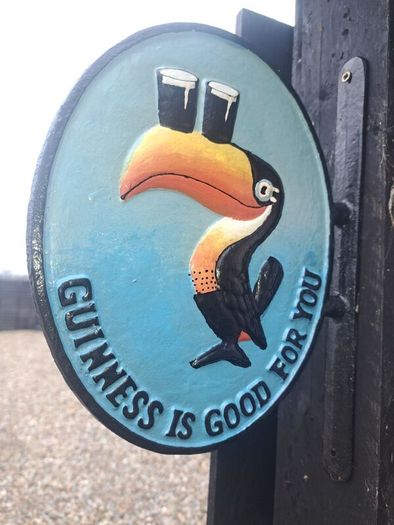 Guinness cast iron sign  2 sided