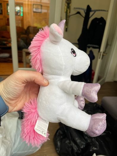 Cuddly white and pink unicorn