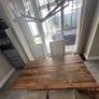 Solid reclaimed wood dining table w/ thick wood plank top. Quality construction. Seats 4-6. Natural patina. Imported from the US. Image 4