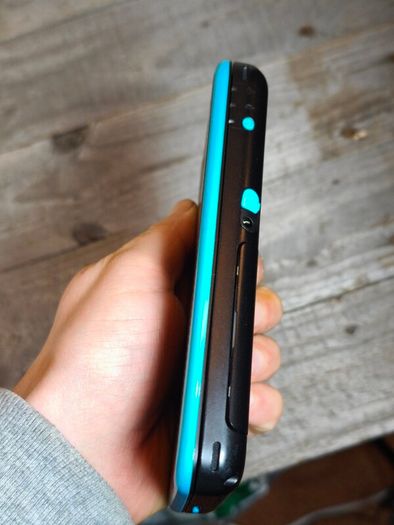 nintendo new 2ds xl with 4 games ,R buttons is not responding