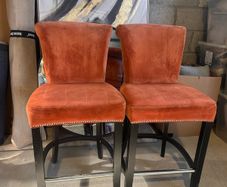 2 Orange High Stools