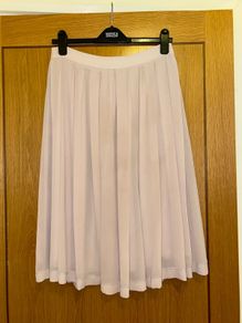 Pale pink pleated skirt