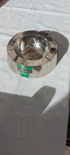 Heineken metal ashtray ,used condition, still nice condition ,buyer collects or pays postage thank you, sold as is,