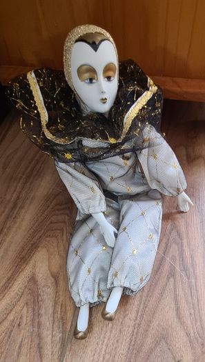 Porcelain theater doll