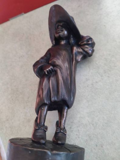 Genesis Sculpture Of A Small Girl Dressing Up With Her Moms Clothes