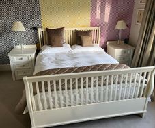 Double Bed with mattress, bedside lockers & lamps