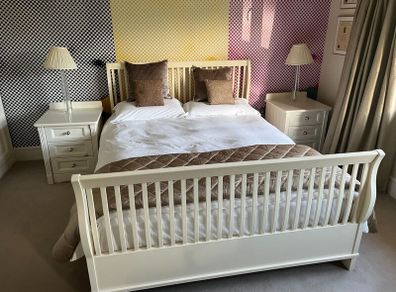 Double Bed with mattress, bedside lockers & lamps