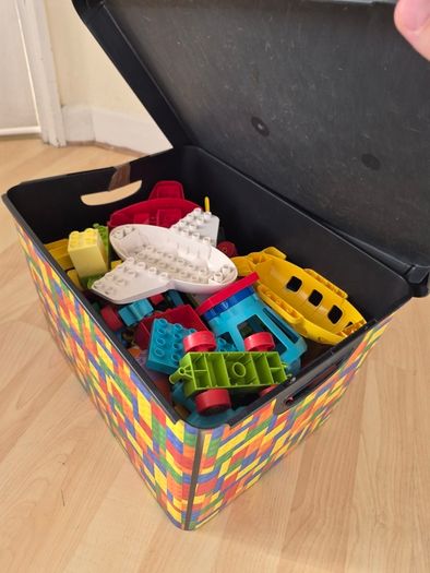 wooden train tracks and full box of Lego Duplo