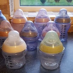 Tomee Tippee bottles, new soothers, bottle thermal holders x 2 and formula measure containers