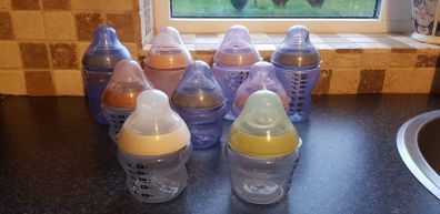 Tomee Tippee bottles, new soothers, bottle thermal holders x 2 and formula measure containers