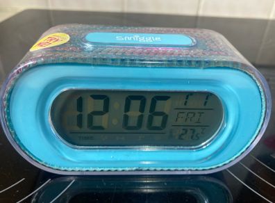 Smiggle light up talking clock