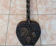 antique ornate fire bellow