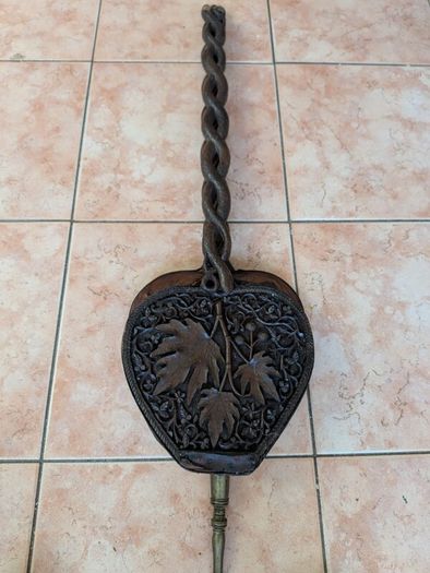 antique ornate fire bellow