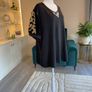 Ladies Black Short-sleeve Top Features Sheer polka-dot mesh sleeves Image 7