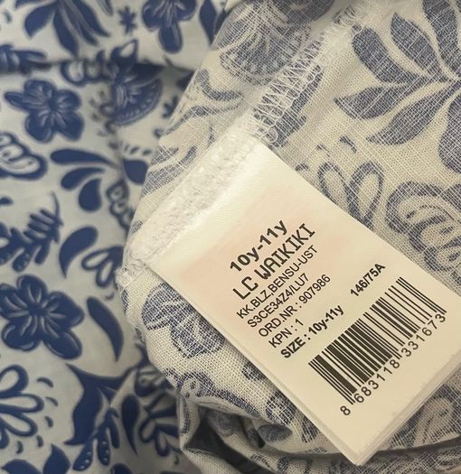 Vintage-Style LC Waikiki Asymmetrical Blue Botanical Ruffle Blouse