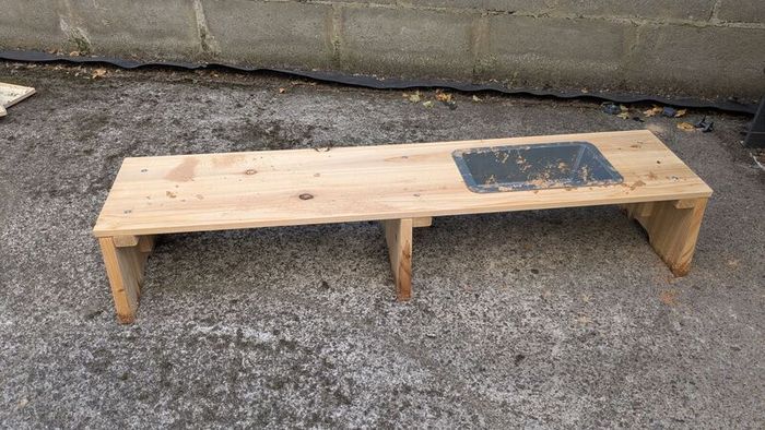 Wooden sandpit