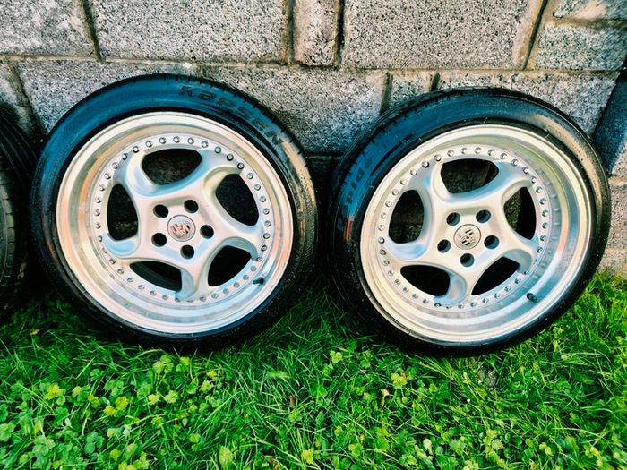 R18 5x112 Porsche Twist replica alloy wheels staggered with tyres