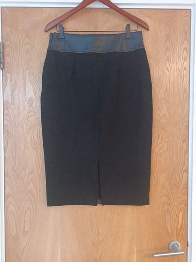 River Island  Black Faux Leather/Stretch  Material  A-Line  Skirt.   S. 14..  NEw - No Paper Tag.